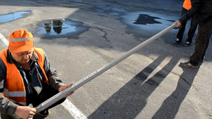 Cut the sleeve and put it on the pole