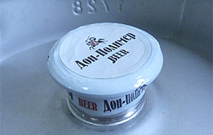 Beer keg reliably protected from tampering and adverse conditions